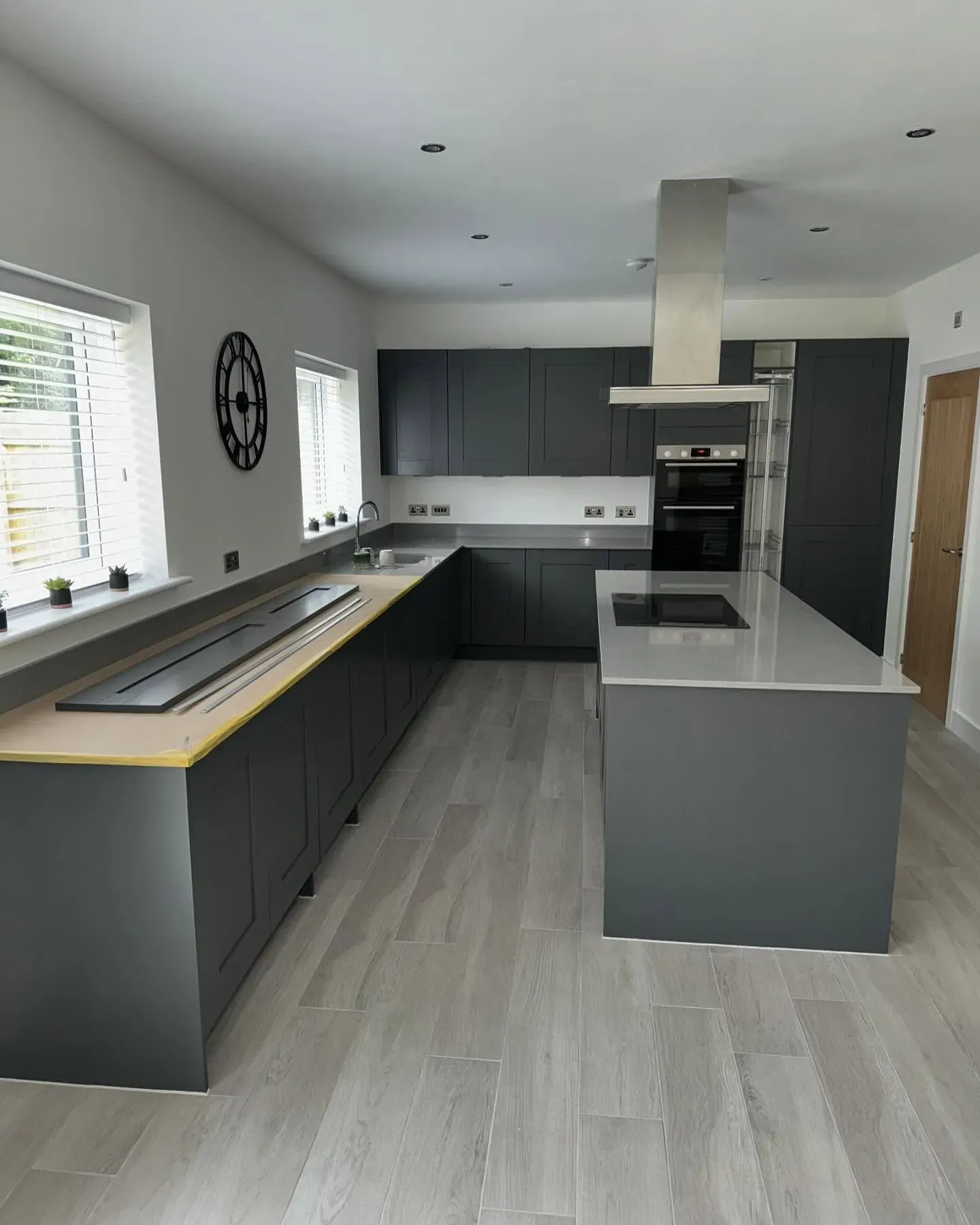 Hopper Head dark kitchen cabinets 