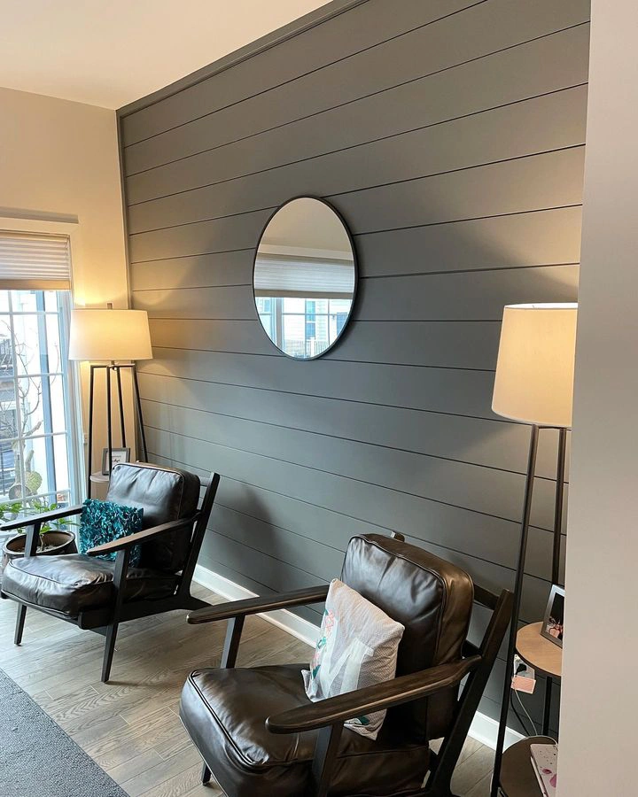 Dark grey panelled accent wall Sherwin Williams Grizzle Gray