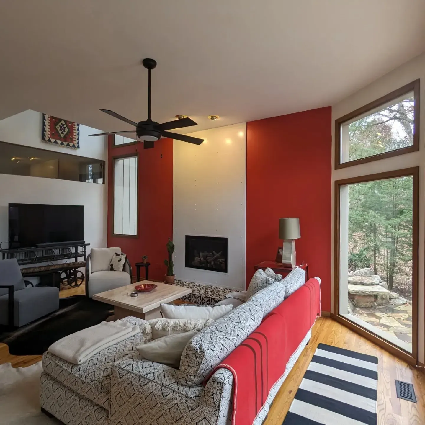 Sherwin Williams Habanero Chile living room accent wall