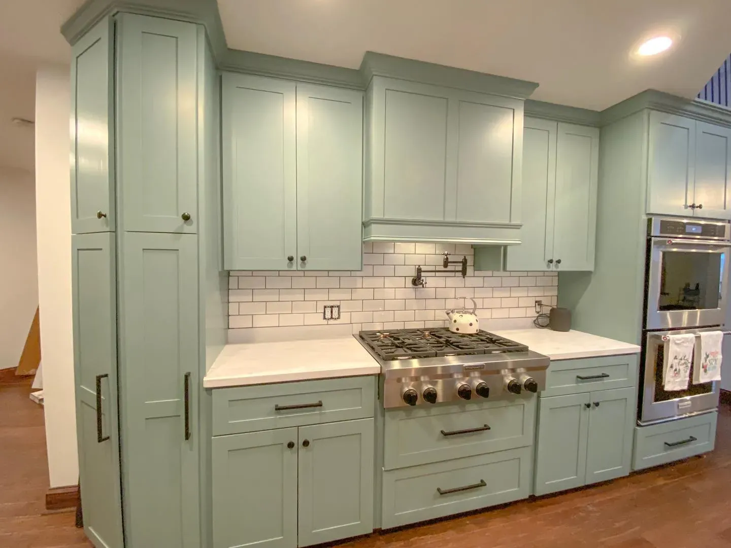 Sherwin Williams Halcyon Green kitchen cabinets 