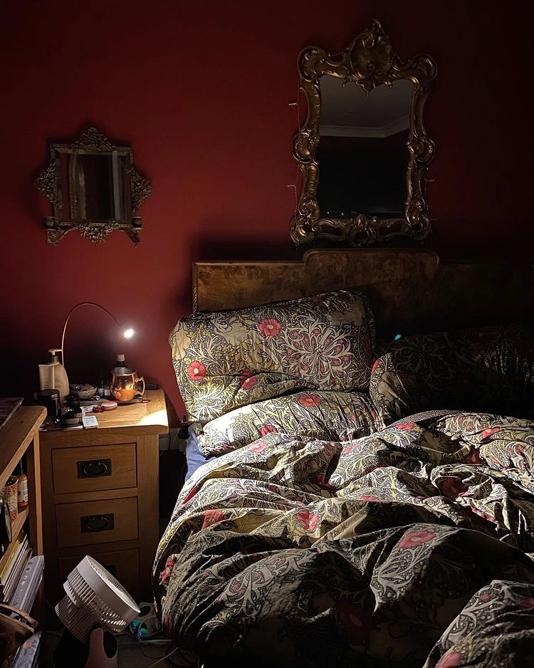 Dark red bedroom interior Farrow and Ball Incarnadine 248