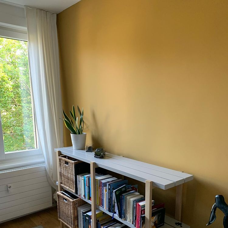 Yellow accent wall design with Farrow and Ball