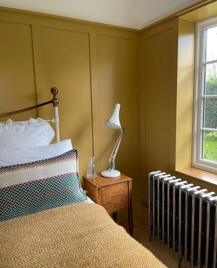 Yellow bedroom interior with Farrow and Ball Yellow and Ball