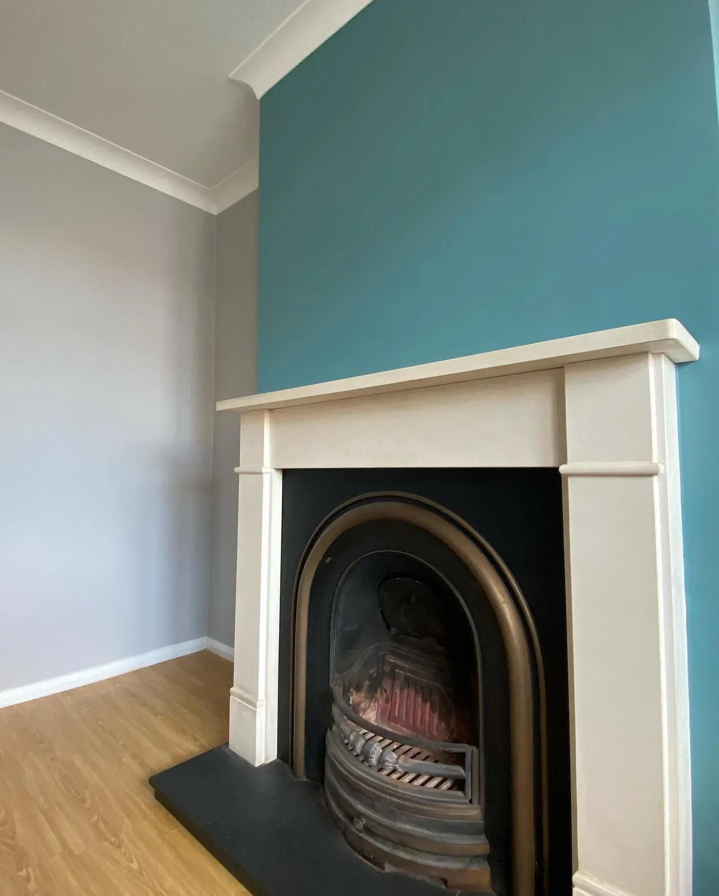 Dulux Maritime Teal victorian living room fireplace paint