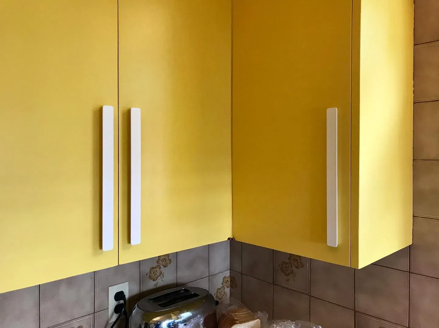 Sherwin Williams Naples Yellow kitchen cabinets 