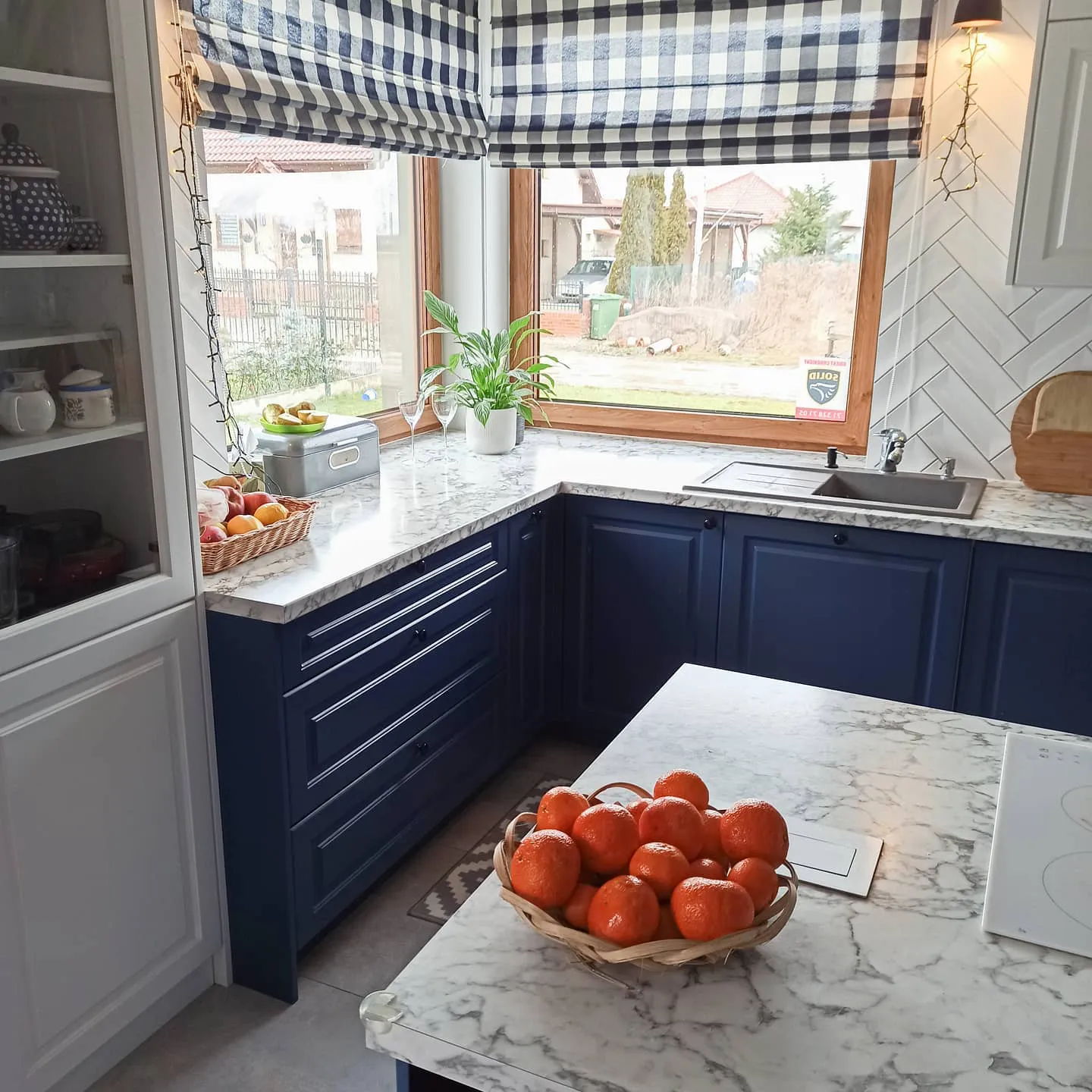 Scandinavian kitchen with blue cabinets RAL 5000