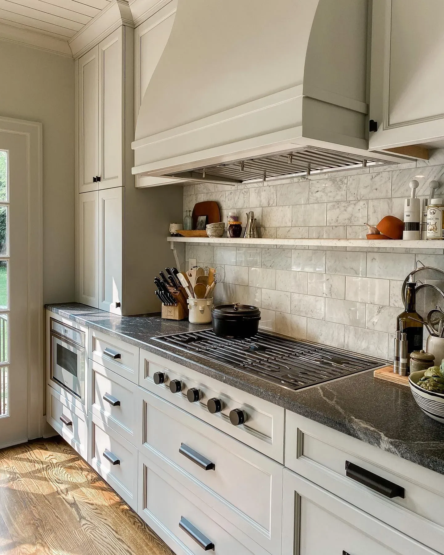 Sherwin Williams Repose Gray kitchen cabinets photo