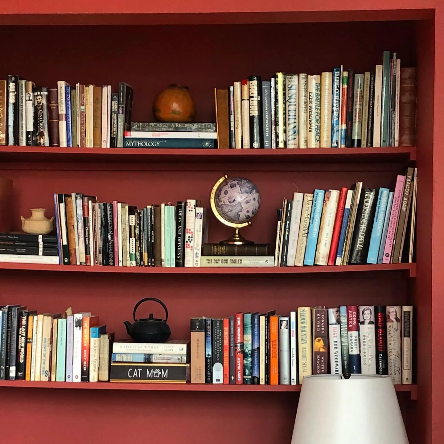 Red shelves painted with Sherwin Williams Bravado Red