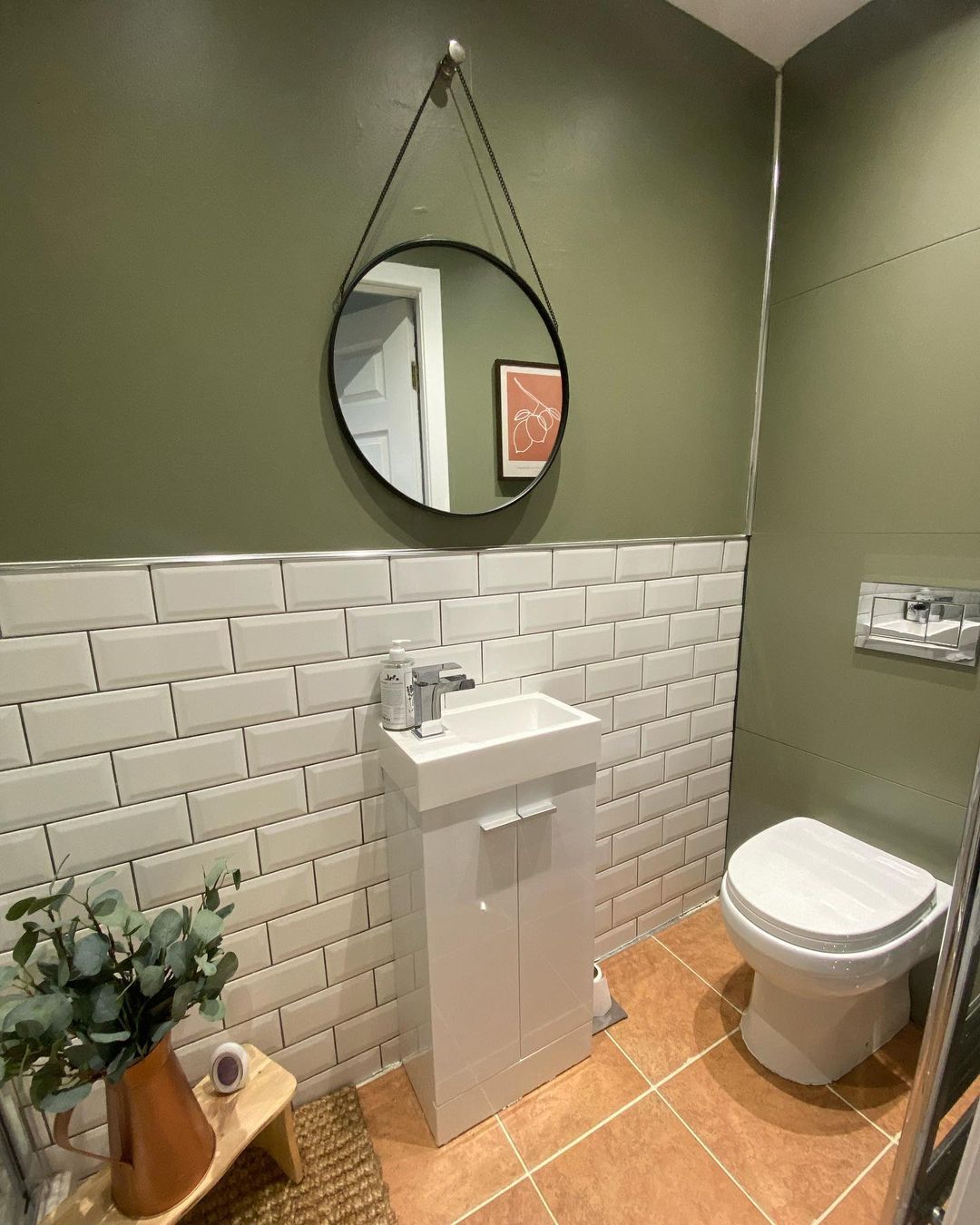 Bathroom with metro tiles and sage green Treron colour