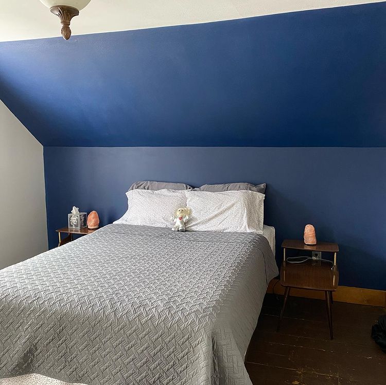 Bedroom dark blue accent wall Behr Very Navy M500-7
