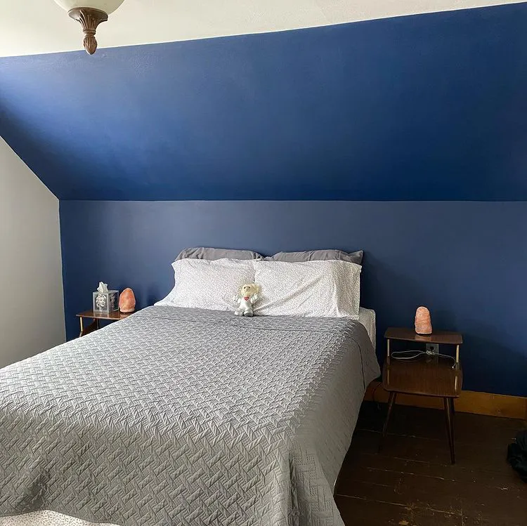 Bedroom dark blue accent wall Behr Very Navy M500-7