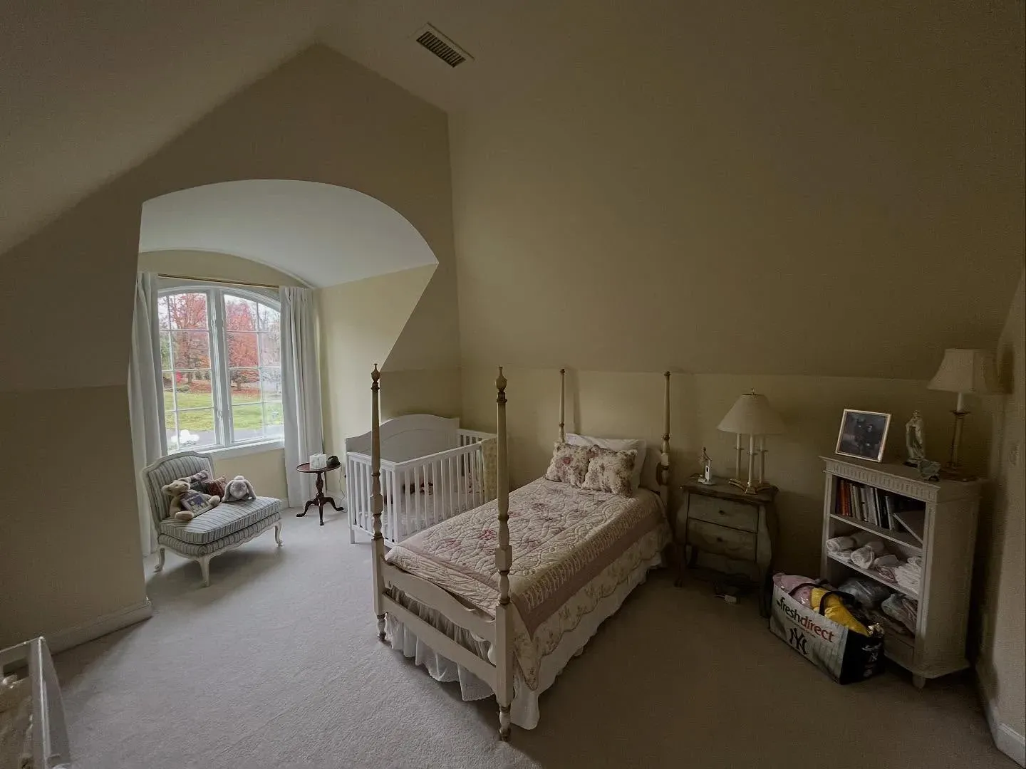 Sherwin Williams Vital Yellow bedroom interior