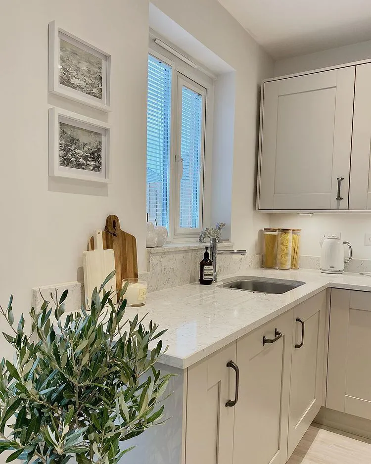 Light neutral style kitchen with Wevet Farrow and Ball