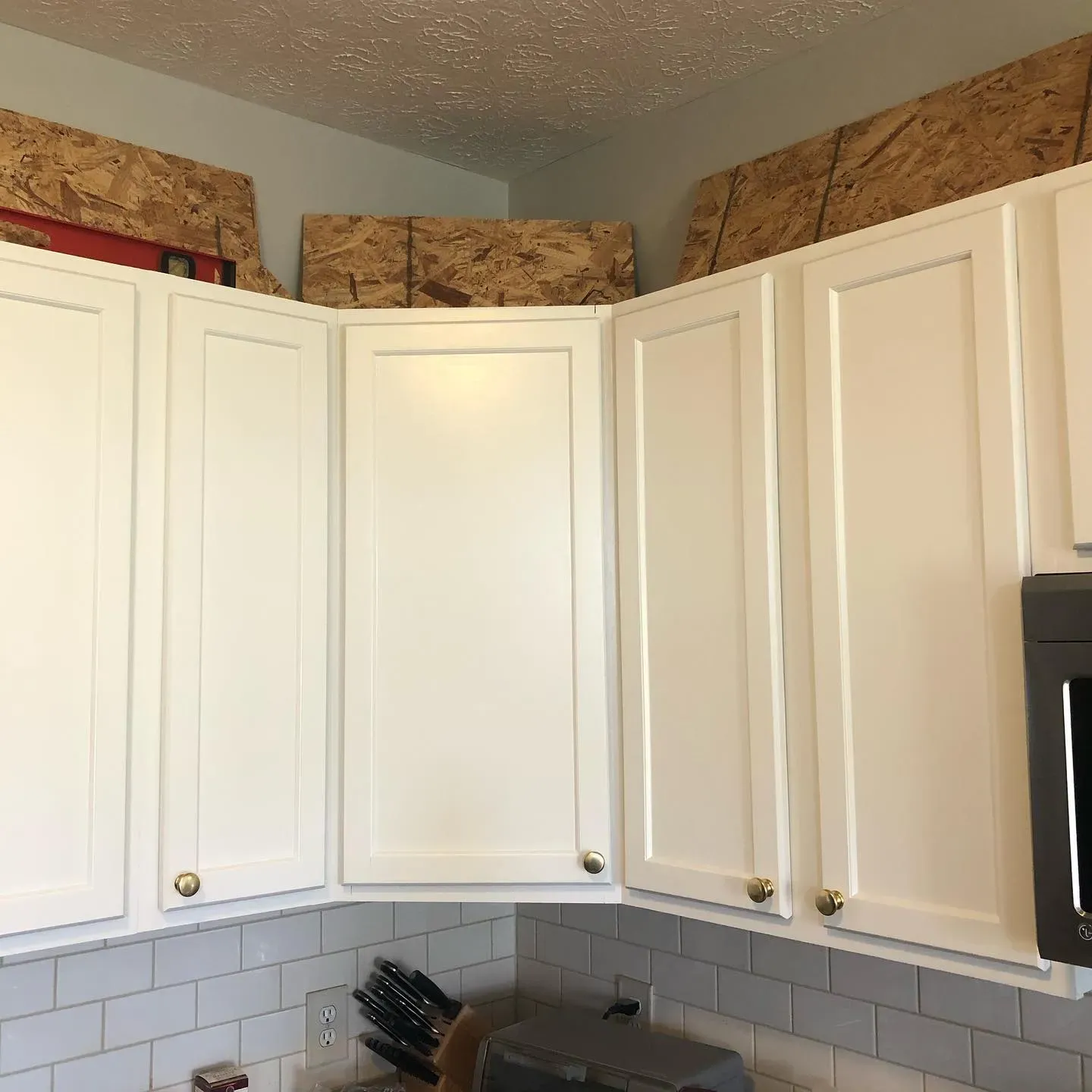 SW 7103 kitchen cabinets color