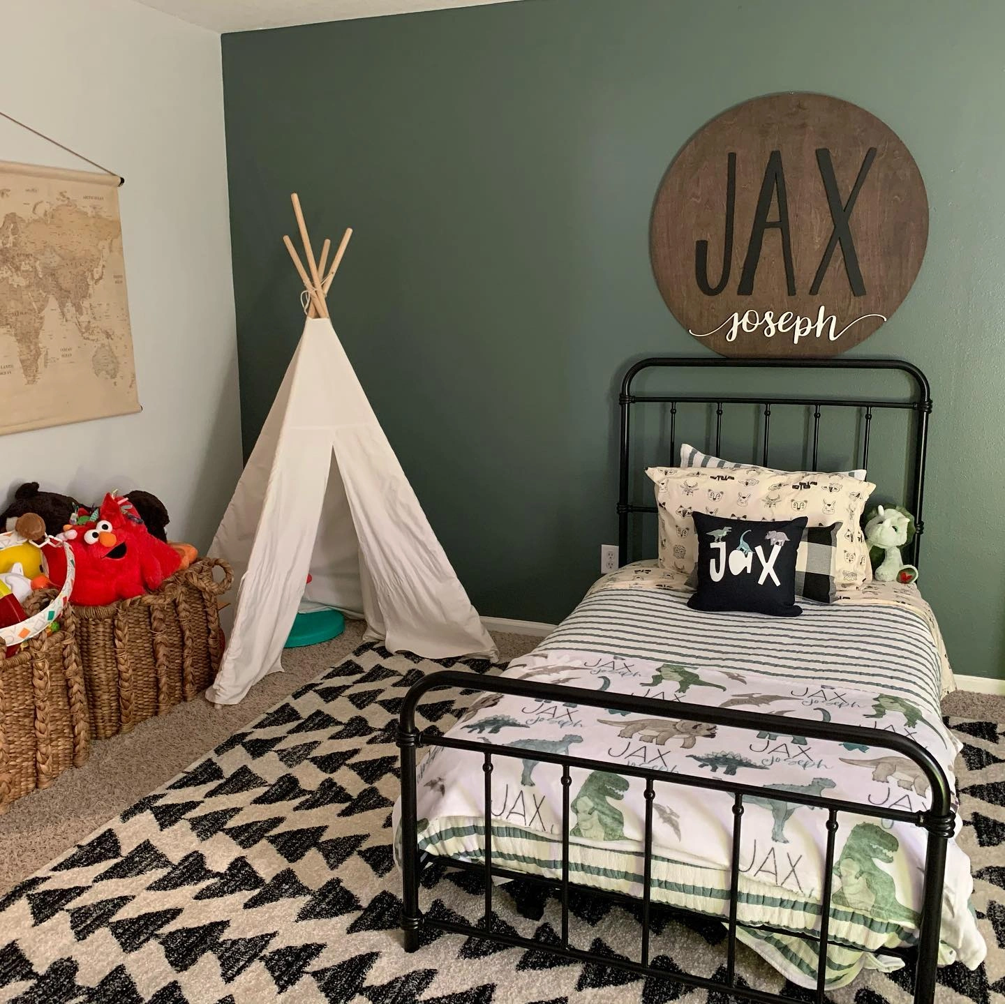 Boys' bedroom with green accent wall